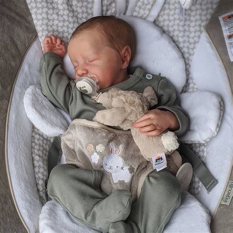 fake baby boy clothes - realistic reborn baby dolls.